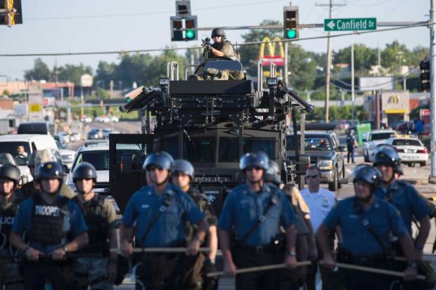 Riot police stand guard in Ferguson, Missouri. Aug 13. Source: Mario Anzuoni